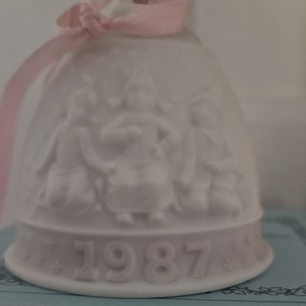 Vintage Lladro collectible Christmas Bell ornament celebrating 1987.